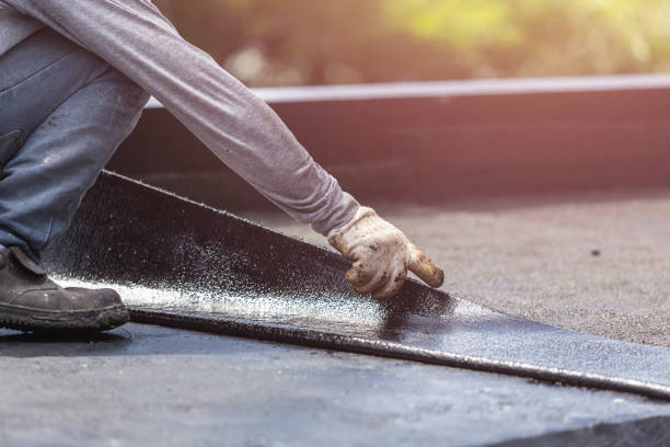 Professional Basement Waterproofing technician working in Lorton, VA